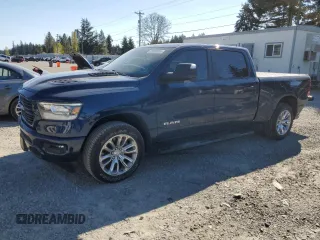 2023 Ram 1500 Laramie with VIN 1C6SRFRT1PN589871, listed as a Copart auction lot 53389555 with 27,053 mi miles and Salvage title. Bid and sale history available at DreamBid. Image 1.