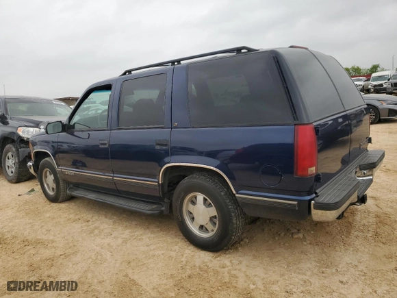 1996 Chevrolet Tahoe Limited with VIN 1GNEC13R3TJ330329, listed as a Copart auction lot 50984595 with 363,240 mi miles and Salvage Title. Bid and sale history available at carsss.com. Image 2.