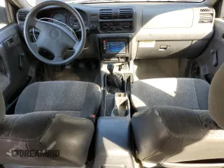 2000 Isuzu Rodeo S with VIN 4S2CK58W7Y4309261, listed as a Copart auction lot 54000775 with 187,949 mi miles and Salvage title. Bid and sale history available at DreamBid. Image 8.