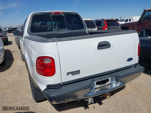 2002 Ford F-150 XLT with VIN 1FTRW07L92KC55405, listed as a IAAI auction lot 41645797 with 198,211 mi miles. Bid and sale history available at carsss.com. Image 3.