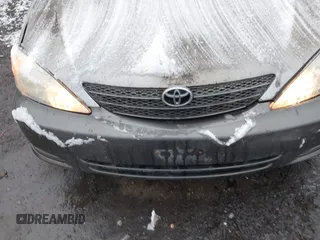 2004 Toyota Camry LE z VIN 4T1BE32K64U896809, wystawiony jako IAAI lot #41075176 z przebiegiem 223 763 mil mil oraz . Historia ofert i sprzedaży dostępna na DreamBid. Obrazek 6.