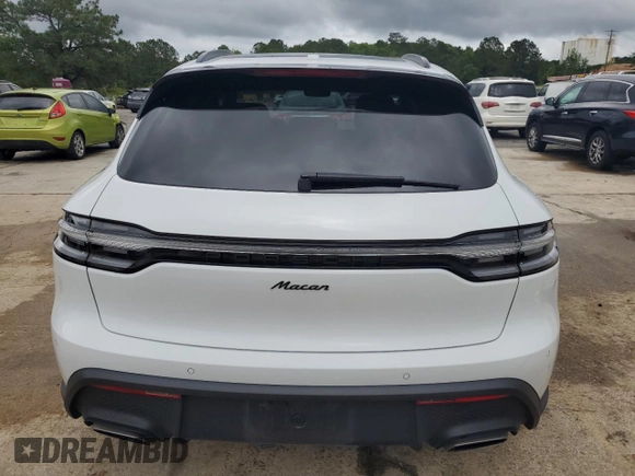 2023 Porsche Macan with VIN WP1AA2A53PLB20826, listed as a Copart auction lot 56461875 with 22,357 mi miles and Salvage title. Bid and sale history available at DreamBid. Image 6.