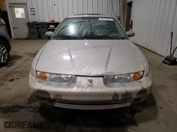 2000 Saturn SL with VIN 1G8ZK5273YZ239987, listed as a Copart auction lot 41577615 with 145,659 mi miles and Salvage title. Bid and sale history available at DreamBid. Image 5.