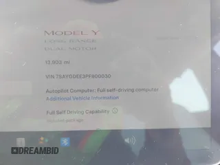 2023 Tesla Model Y Long Range with VIN 7SAYGDEE3PF900030, listed as a IAAI auction lot 41147192 with 13,903 mi miles and . Bid and sale history available at DreamBid. Image 7.