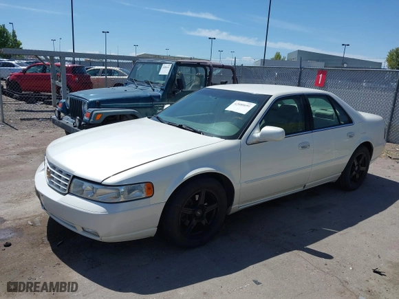 2003 Cadillac Seville Touring STS with VIN 1G6KY54963U110607, listed as a IAAI auction lot 42080691 with 79,605 mi miles. Bid and sale history available at carsss.com. Image 2.