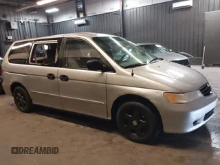 2002 Honda Odyssey LX z VIN 2HKRL18532H573727, wystawiony jako IAAI lot #42266783 z przebiegiem 127 491 mil mil oraz . Historia ofert i sprzedaży dostępna na DreamBid. Obrazek 14.