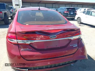 2017 Ford Fusion Titanium with VIN 3FA6P0K90HR184777, listed as a IAAI auction lot 41722188 with 116,654 mi miles. Bid and sale history available at carsss.com. Image 16.