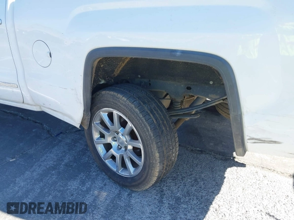 2014 GMC Sierra 1500 Denali z VIN 3GTU2WEJ2EG349289, wystawiony jako IAAI lot #41313698 z przebiegiem 190 441 mil mil oraz . Historia ofert i sprzedaży dostępna na DreamBid. Obrazek 6.