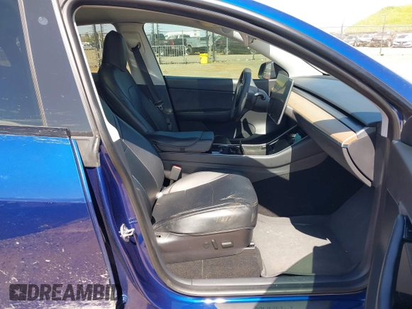 2020 Tesla Model Y Long Range with VIN 5YJYGDEF4LF000494, listed as a IAAI auction lot 41894856 with 118,638 mi miles and . Bid and sale history available at DreamBid. Image 5.