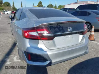 2019 Honda Clarity Touring z VIN JHMZC5F38KC003399, wystawiony jako IAAI lot #41818175 z przebiegiem 54 896 mil mil oraz . Historia ofert i sprzedaży dostępna na DreamBid. Obrazek 3.