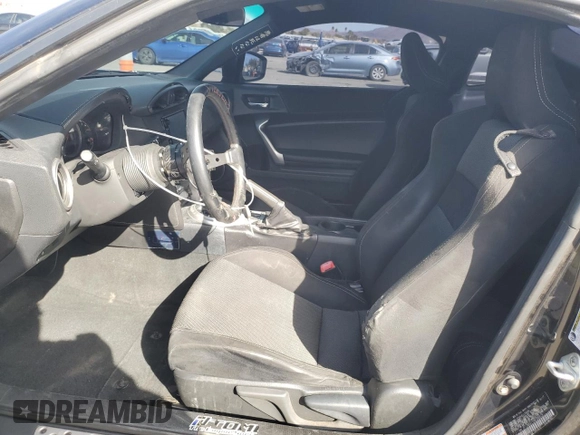 2017 Toyota 86 z VIN JF1ZNAA11H8704619, wystawiony jako Copart lot #50272835 z przebiegiem 104 096 mil mil oraz Szkoda całkowita • Salvage title. Historia ofert i sprzedaży dostępna na DreamBid. Obrazek 7.