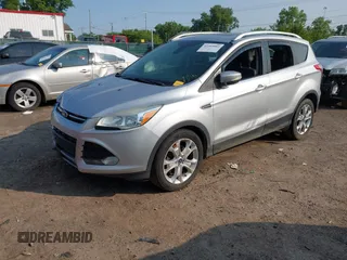 2015 Ford Escape Titanium z VIN 1FMCU0J90FUC02039, wystawiony jako IAAI lot #42369882 z przebiegiem 156 287 mil mil oraz . Historia ofert i sprzedaży dostępna na DreamBid. Obrazek 16.