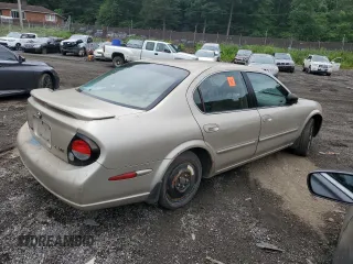 2001 Nissan Maxima GXE with VIN JN1CA31D61T615507, listed as a Copart auction lot 60787575 with Not provided miles and Salvage title. Bid and sale history available at DreamBid. Image 4.