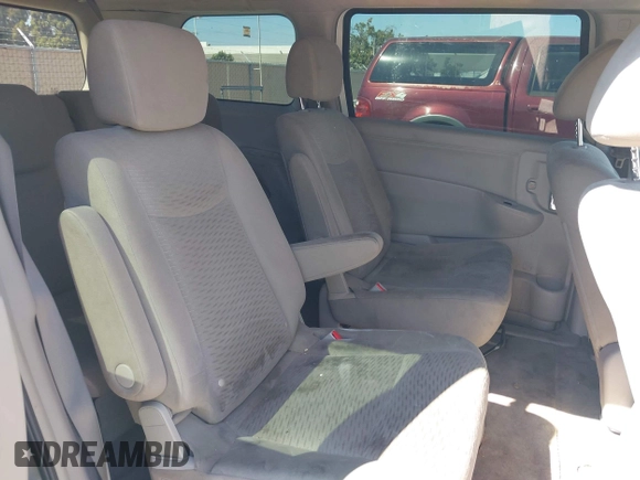 2014 Nissan Quest S with VIN JN8AE2KP7E9107596, listed as a IAAI auction lot 42745979 with 180,780 mi miles and . Bid and sale history available at DreamBid. Image 8.