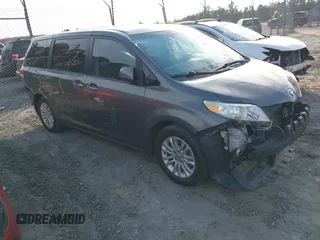 2012 Toyota Sienna XLE AAS with VIN 5TDYK3DC7CS276681, listed as a IAAI auction lot 41520303 with 183,511 mi miles. Bid and sale history available at carsss.com. Image 1.