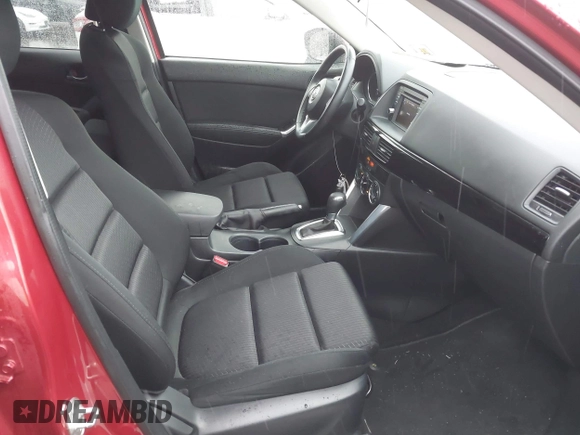 2015 Mazda CX-5 Touring with VIN JM3KE4CY3F0529669, listed as a IAAI auction lot 41866873 with 137,635 mi miles and . Bid and sale history available at carsss.com. Image 5.