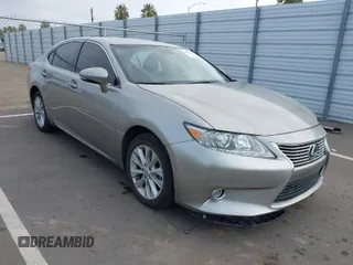 2015 Lexus ES 300h z VIN JTHBW1GG0F2080458, wystawiony jako IAAI lot #41895688 z przebiegiem 106 138 mil mil oraz . Historia ofert i sprzedaży dostępna na DreamBid. Obrazek 1.