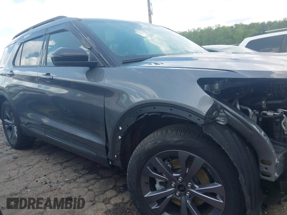 2022 Ford Explorer XLT z VIN 1FMSK7DH8NGB12227, wystawiony jako IAAI lot #42171362 z przebiegiem 7 543 mil mil oraz . Historia ofert i sprzedaży dostępna na DreamBid. Obrazek 14.