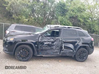 2021 Jeep Cherokee Latitude with VIN 1C4PJLCB9MD125782, listed as a IAAI auction lot 42251788 with 89,534 mi miles and . Bid and sale history available at DreamBid. Image 14.