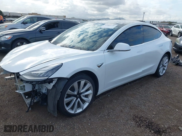 2019 Tesla Model 3 Long Range with VIN 5YJ3E1EBXKF512710, listed as a IAAI auction lot 42063737 with 90,721 mi miles and . Bid and sale history available at DreamBid. Image 20.