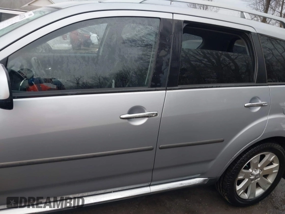 2009 Mitsubishi Outlander SE z VIN JA4MT31W89Z003101, wystawiony jako IAAI lot #41487678 z przebiegiem 90 226 mil mil oraz . Historia ofert i sprzedaży dostępna na DreamBid. Obrazek 14.