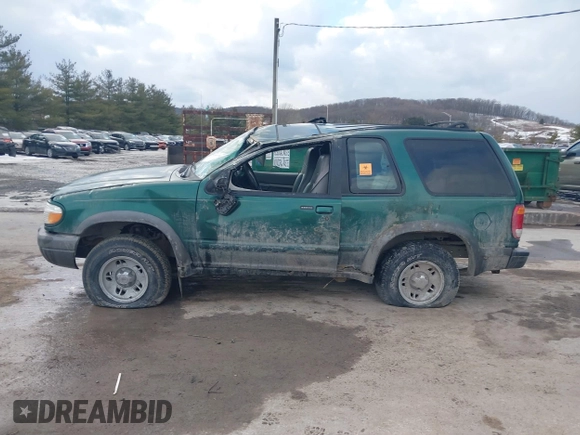 1999 Ford Explorer z VIN 1FMZU24E7XUA94325, wystawiony jako IAAI lot #41440741 z przebiegiem 99 926 mil mil oraz . Historia ofert i sprzedaży dostępna na DreamBid. Obrazek 14.