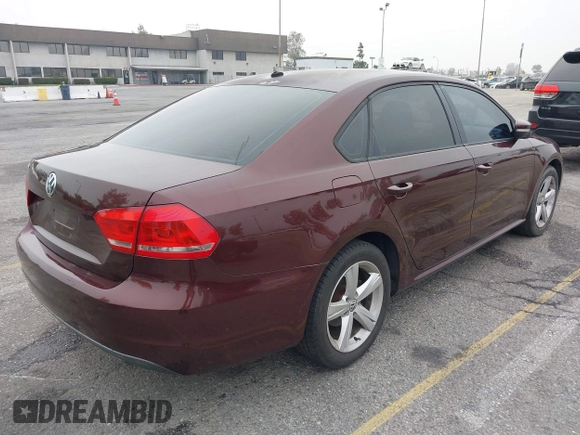 2013 Volkswagen Passat Wolfsburg Edition with VIN 1VWAP7A38DC136413, listed as a IAAI auction lot 42022470 with 265,221 mi miles. Bid and sale history available at carsss.com. Image 4.