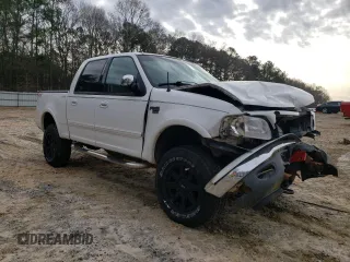 2002 Ford F-150 XLT with VIN 1FTRW08682KC80529, listed as a Copart auction lot 37546994 with 159,980 mi miles and Salvage Title. Bid and sale history available at carsss.com. Image 4.