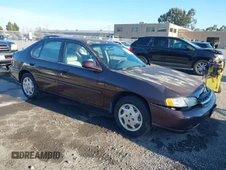 1999 Nissan Altima XE with VIN 1N4DL01D3XC209869, listed as a IAAI auction lot 41414580 with 175,076 mi miles. Bid and sale history available at carsss.com. Image 1.