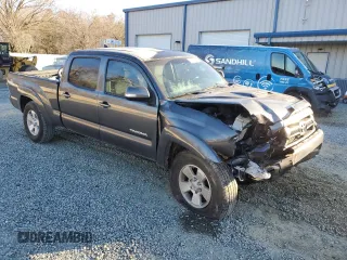 2015 Toyota Tacoma PreRunner with VIN 3TMKU4HN2FM043748, listed as a Copart auction lot 88764915 with 160,731 mi miles and Salvage title. Bid and sale history available at DreamBid. Image 4.
