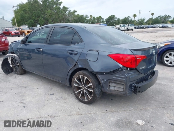 2018 Toyota Corolla L with VIN 5YFBURHE1JP814781, listed as a IAAI auction lot 42408378 with 115,543 mi miles and . Bid and sale history available at DreamBid. Image 3.