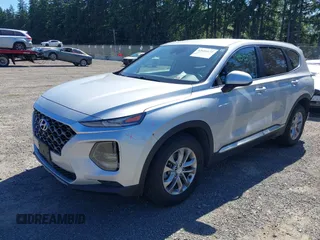 2019 Hyundai Santa Fe SE with VIN 5NMS2CAD9KH122140, listed as a IAAI auction lot 42616171 with 50,794 mi miles and . Bid and sale history available at DreamBid. Image 18.