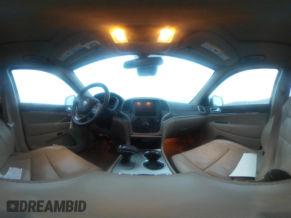 2014 Jeep Grand Cherokee Overland with VIN 1C4RJFCG9EC299235, listed as a IAAI auction lot 41670065 with 108,589 mi miles and . Bid and sale history available at DreamBid. Image 22.
