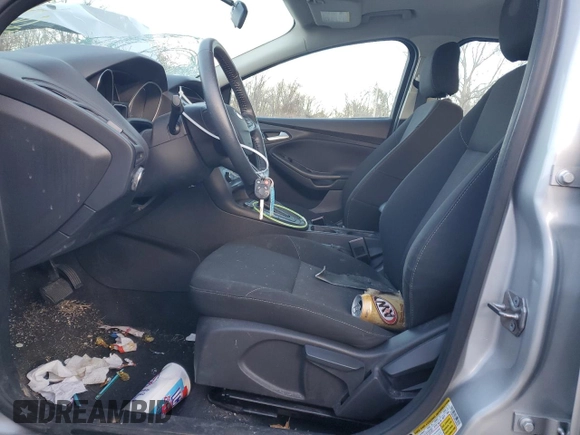 2015 Ford Focus SE with VIN 1FADP3F2XFL306322, listed as a Copart auction lot 41367765 with 58,901 mi miles and Salvage Title. Bid and sale history available at DreamBid. Image 7.