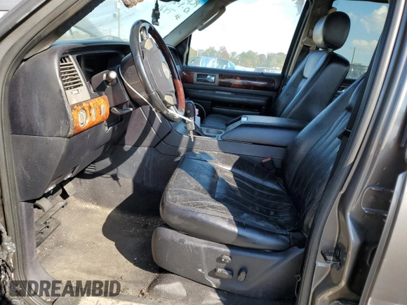 2003 Lincoln Navigator Luxury with VIN 5LMFU28R43LJ34986, listed as a Copart auction lot 77641924 with 188,803 mi miles and Salvage Title. Bid and sale history available at carsss.com. Image 7.