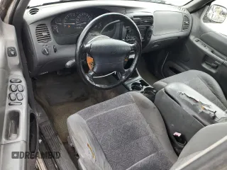 1999 Ford Explorer XLT with VIN 1FMZU32E7XUC76809, listed as a Copart auction lot 45503065 with 276,876 mi miles and Salvage title. Bid and sale history available at DreamBid. Image 8.