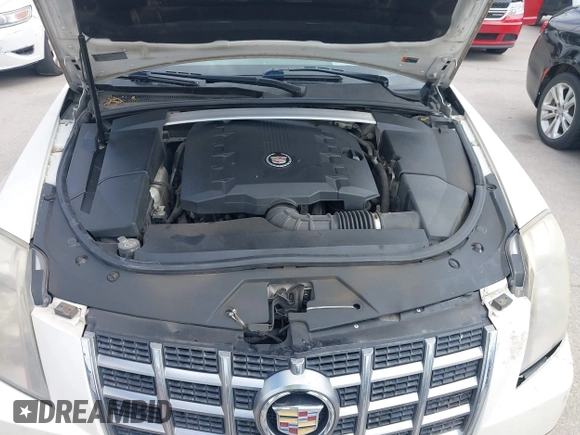 2012 Cadillac CTS Luxury with VIN 1G6DF5E50C0131857, listed as a IAAI auction lot 42610389 with 85,896 mi miles and . Bid and sale history available at DreamBid. Image 10.