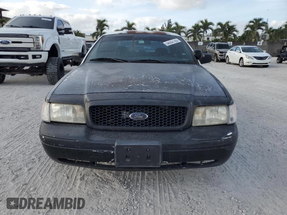 2005 Ford Police Interceptor with VIN 2FAFP71W35X128684, listed as a Copart auction lot 54002165 with 144,766 mi miles and Clean title. Bid and sale history available at DreamBid. Image 5.