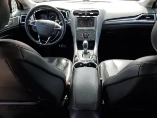 2014 Ford Fusion Titanium Hybrid with VIN 3FA6P0RU0ER336501, listed as a Copart auction lot 55223855 with 194,173 mi miles and Clean Title. Bid and sale history available at carsss.com. Image 8.