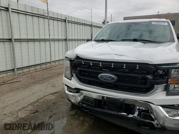 2023 Ford F-150 XL with VIN 1FTEW1EP3PFC53689, listed as a Copart auction lot 51655475 with 17,681 mi miles and Salvage title. Bid and sale history available at DreamBid. Image 13.
