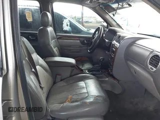 2004 GMC Envoy SLT with VIN 1GKDS13S942267554, listed as a IAAI auction lot 41754066 with 178,895 mi miles. Bid and sale history available at carsss.com. Image 5.