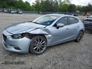 2018 Mazda 3 Touring z VIN 3MZBN1L30JM164074, wystawiony jako Copart lot #56741745 z przebiegiem 86 812 mil mil oraz Szkody całkowita. Historia ofert i sprzedaży dostępna na DreamBid. Obrazek 1.