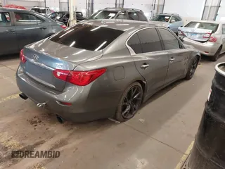 2015 Infiniti Q50 Premium with VIN JN1BV7AP2FM345954, listed as a IAAI auction lot 41514027 with 79,957 mi miles. Bid and sale history available at carsss.com. Image 4.