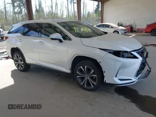 2021 Lexus RX with VIN JTJHZKFA2M2030841, listed as a IAAI auction lot 42009263 with 38,113 mi miles. Bid and sale history available at carsss.com. Image 1.