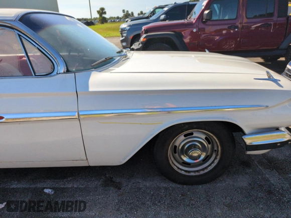 1961 Chevrolet Impala с VIN 11739B190181, выставлен на аукционе Copart как лот 75408464 с пробегом 85 386 миль миль и Списание • Salvage title. История ставок и продаж доступна на DreamBid. Изображение 12.