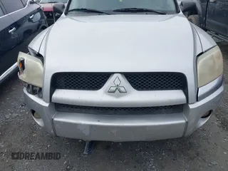 2007 Mitsubishi Raider LS with VIN 1Z7HC28K57S109584, listed as a IAAI auction lot 41498422 with 329,680 mi miles. Bid and sale history available at carsss.com. Image 6.