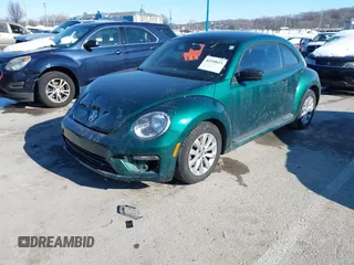 2017 Volkswagen Beetle 1.8T Fleet with VIN 3VWF17AT6HM618275, listed as a IAAI auction lot 41318611 with 134,594 mi miles. Bid and sale history available at carsss.com. Image 2.