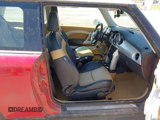2006 MINI Hardtop S with VIN WMWRE33526TG99561, listed as a IAAI auction lot 42230639 with 202,113 mi miles and . Bid and sale history available at DreamBid. Image 5.