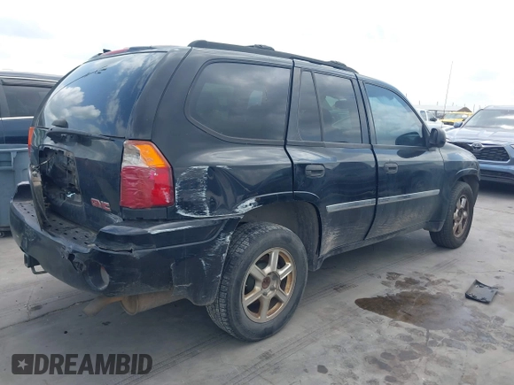 2009 GMC Envoy SLE z VIN 1GKDS33S592105035, wystawiony jako IAAI lot #42089058 z przebiegiem 249 127 mil mil oraz . Historia ofert i sprzedaży dostępna na DreamBid. Obrazek 4.