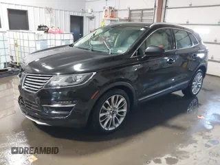 2015 Lincoln MKC with VIN 5LMCJ1A98FUJ10348, listed as a IAAI auction lot 41566416 with 133,035 mi miles and . Bid and sale history available at DreamBid. Image 17.